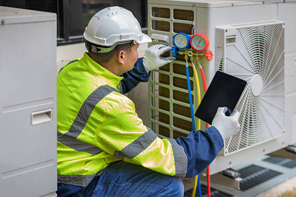 Professional Hvac technician working in Ash, NC